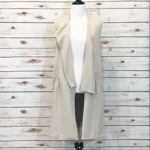 * 1. State • Open Front Long Vest